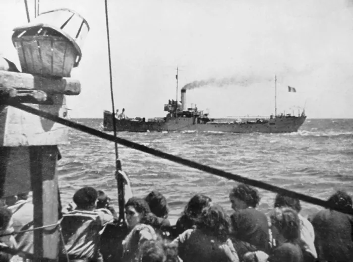 Framed Print : Spanish Civil War (1936-1939). Evacuation of a northern town to France. Ship with refugees on the Cantabrian Sea escorted by a French ship (1937). Private Collection