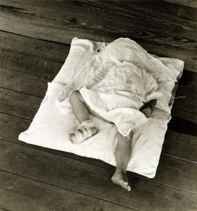 Framed Print : Squeakie asleep. Othel Lee, known as Squeakie, son of Floyd Burroughs, sharecropper. Hale County, Alabama. Published in the book, Let Us Now Praise Famous Men