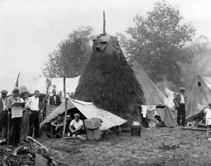 Framed Print : St. Louis Bonus Veterans encampment in Johnstown, Pennsylvania. One ingenuous shelter is thatched with hay and has a swanky tent entrance. Aug. 3, 1932