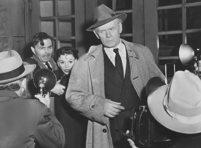 Framed Print : A STAR IS BORN, from left: James Mason, Judy Garland, Charles Bickford, 1954