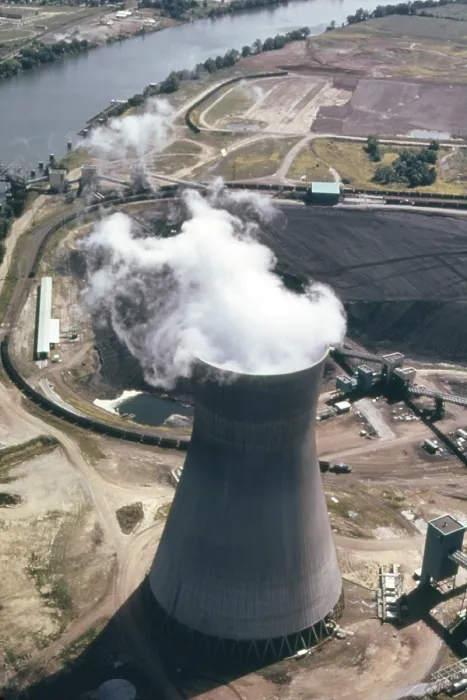 Framed Print : Steam rises from one of the massive cooling towers of the John Amos Power Plant which generates electricity from coal a abundant resource in West Virginia. Ca. 1973-75