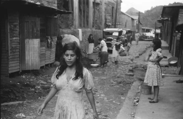 Framed Print : A street in the slum area of the hill town of Lares, in western Puerto Rico. January 1942 photograph by Jack Delano