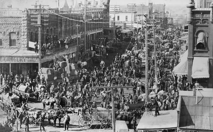 Framed Print : The streets of Gurthrie, Oklahoma, are crowed with wagons of bailed cotton and hundreds of people. Photo was taken by Harmon T Framed Print : The streets of Gurthrie, Oklahoma, are crowed with wagons of bailed cotton and hundreds of people. Photo was taken by Harmon T