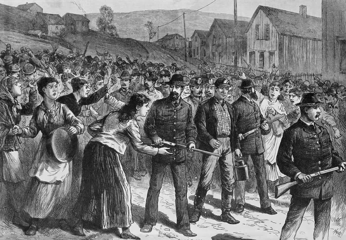 Framed Print : Striking miners and their women harass Blackleg workers protected by armed Pinkerton guards