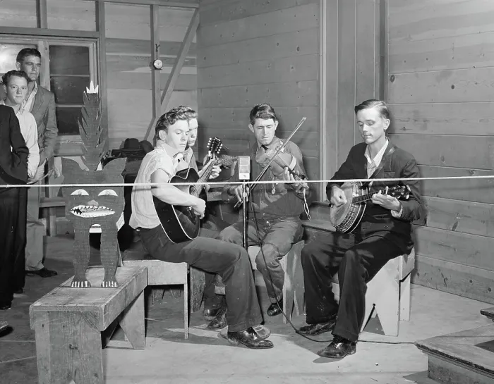 Framed Print : String band playing at Saturday night dance with a kitty for contributions, Tulare migrant camp. Visalia, California, March 1940