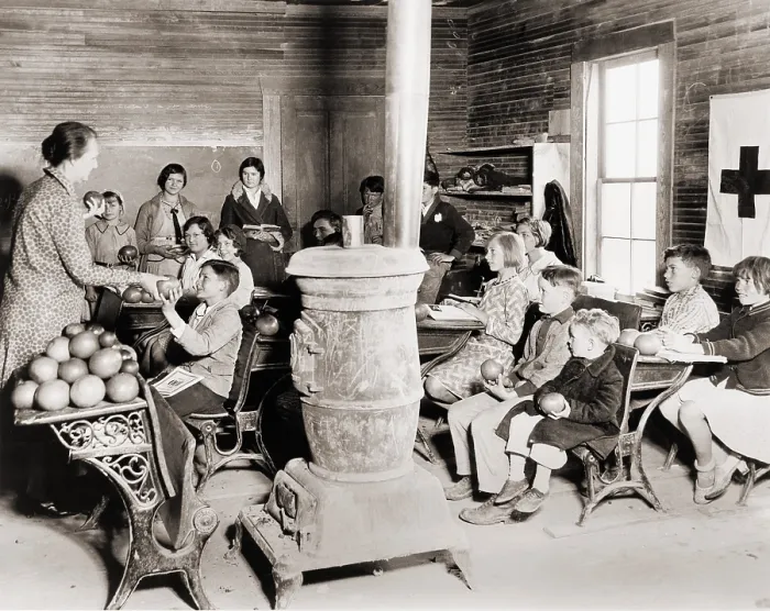 Framed Print : Students in a one-room school near Sunflower, Mississippi receive grapefruit from Red Cross disaster relief during the 1930-31 drought that devastated the regions agriculture