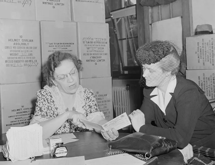 Framed Print : Sugar ration applicant was issued her ration card in May 1942. Washington, D.C. during World War 2, May 1942. (BSLOC_2013_14_164) Framed Print : Sugar ration applicant was issued her ration card in May 1942. Washington, D.C. during World War 2, May 1942. (BSLOC_2013_14_164)