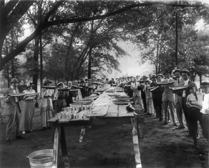 Framed Print : Summer, Commercial Club entertaining with watermelons and lemonade, photograph 1917