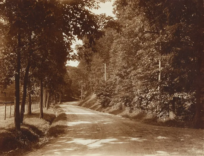 Framed Print : A SUNNY ROAD, by Edward Curtis. This 1904 photo shows straight new utility poles spaced along the country road Framed Print : A SUNNY ROAD, by Edward Curtis. This 1904 photo shows straight new utility poles spaced along the country road