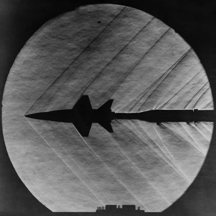 Framed Print : Supersonic Shocks waves attached to a small scale model of the X-15 experiment rocket plane. Mar. 23, 1962 Framed Print : Supersonic Shocks waves attached to a small scale model of the X-15 experiment rocket plane. Mar. 23, 1962