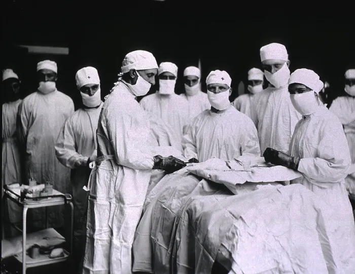 Framed Print : Surgeons and nurses masked in preparation for surgery at U.S. Army General Hospital in Detroit, Michigan. Ca. 1920