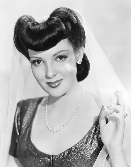 Framed Print : SWEET AND LOW-DOWN, Linda Darnell, 1944, TM & Copyright 20th Century Fox Film Corp. / courtesy Everett Collection Framed Print : SWEET AND LOW-DOWN, Linda Darnell, 1944, TM & Copyright 20th Century Fox Film Corp. / courtesy Everett Collection