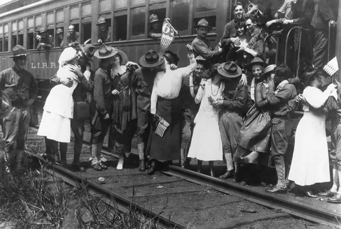 Framed Print : Sweethearts saying goodbye to American WW1 soldiers in August 1917. Relatives of the 69th Infantry of New York see their train off. (BSLOC_2012_4_12)