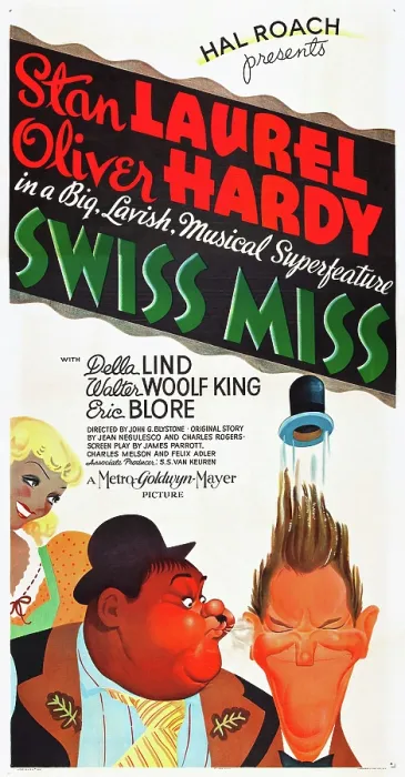 Framed Print : SWISS MISS, l-r: Oliver Hardy, Stan Laurel on poster art, 1938
