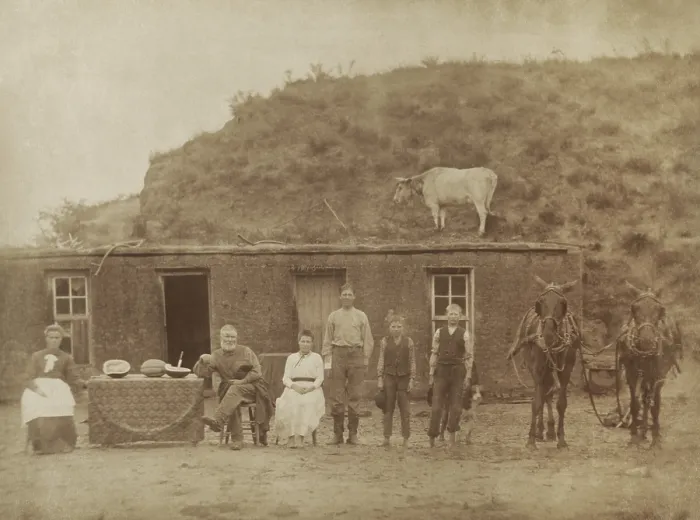 Framed Print : The Sylvester Rawding family in front of sod house, north of Sargent, Custer County, Nebraska, 1886. L-R: Emma (Leadbetter) Rawding, Sylvester W