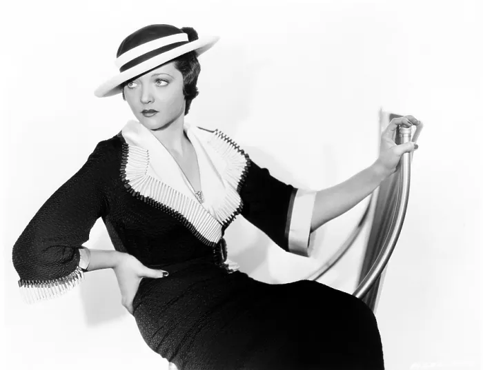 Framed Print : Sylvia Sidney in black matlasso with collar and cuffs of white faille and Mexican Poon hat, 1934 Framed Print : Sylvia Sidney in black matlasso with collar and cuffs of white faille and Mexican Poon hat, 1934