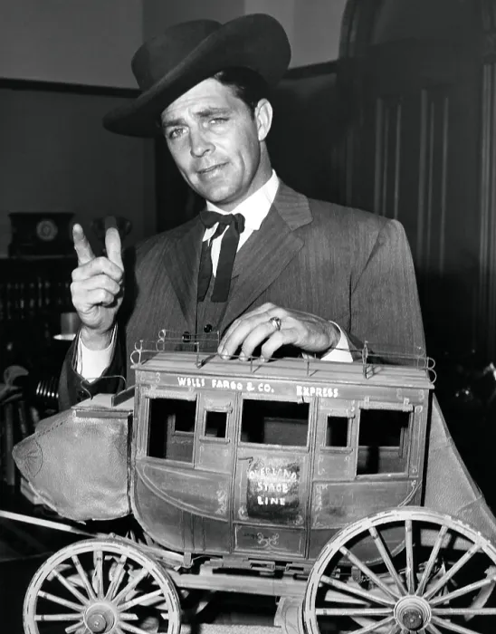 Framed Print : TALES OF WELLS FARGO, Dale Robertson, with a model of the titular mail coach, 1957-62