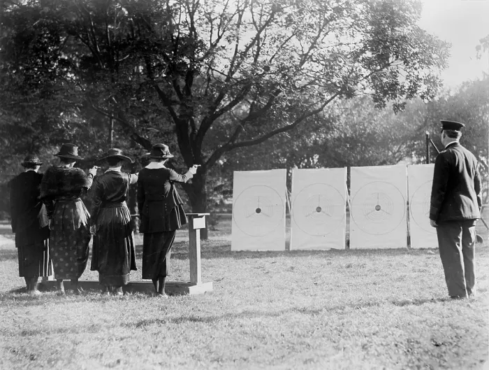 Framed Print : Target shooting, four women shooting at targets as a policeman watches, circa 1909-1932 Framed Print : Target shooting, four women shooting at targets as a policeman watches, circa 1909-1932