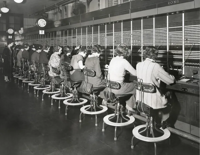 Framed Print : Telephone operators working on an international switchboard in the 1930s. - (BSLOC_2015_1_227) Framed Print : Telephone operators working on an international switchboard in the 1930s. - (BSLOC_2015_1_227)