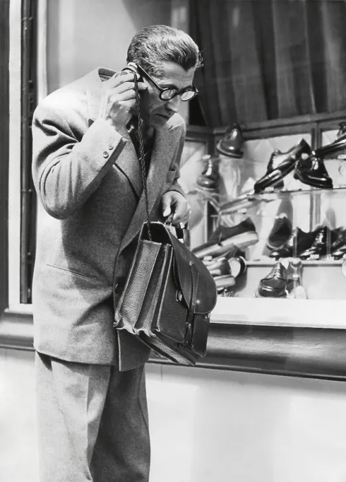 Framed Print : The Telephonogramme in use of the streets of Paris, May 10, 1950. This was an early wireless mobile telephone that could fit into a briefcase. - (BSLOC_2014_17_110) Framed Print : The Telephonogramme in use of the streets of Paris, May 10, 1950. This was an early wireless mobile telephone that could fit into a briefcase. - (BSLOC_2014_17_110)