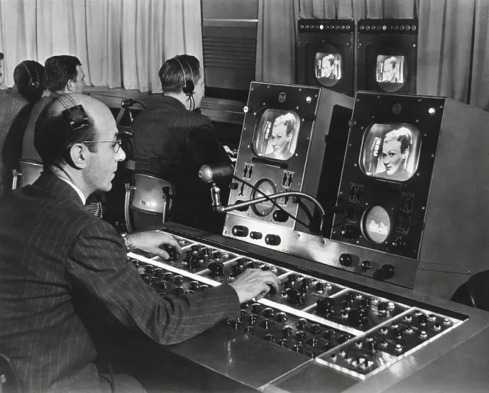 Framed Print : Television studio engineer gets several views of the image and use the complicated set of dials to control the tone and quality of the picture. Ca. 1950. New York City Framed Print : Television studio engineer gets several views of the image and use the complicated set of dials to control the tone and quality of the picture. Ca. 1950. New York City