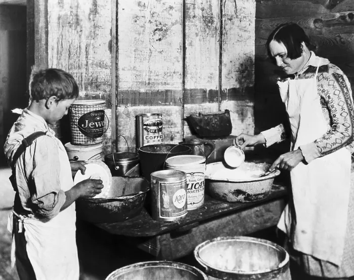 Framed Print : Tenant farming family's Mother and son wash dishes, Mississippi, ca. 1931. They have received Red Cross food during the drought Framed Print : Tenant farming family's Mother and son wash dishes, Mississippi, ca. 1931. They have received Red Cross food during the drought