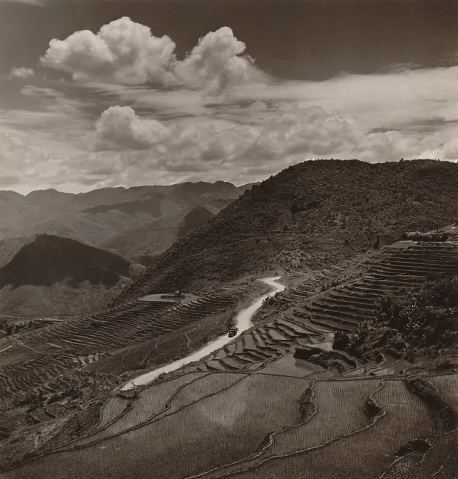 Framed Print : Terraced fields and roadway in a mountainous region of Yunnan Province in China. A military vehicle drives in the distance. 1946 photo by Arthur Rothstein. - (BSLOC_2014_15_146)