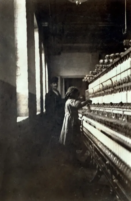Framed Print : A textile mill. Little girl (48 inches high) work in Amoskeag Mfg. Co. She seemed to be 11 or 12 yrs. old. Manchester, N.H, photograph by Lewis Wickes Hine, May 25, 1909 Framed Print : A textile mill. Little girl (48 inches high) work in Amoskeag Mfg. Co. She seemed to be 11 or 12 yrs. old. Manchester, N.H, photograph by Lewis Wickes Hine, May 25, 1909