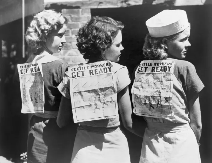 Framed Print : Textile workers displaying picket signs pinned on their backs during Labor Day demonstration in Gastonia, N.C. 1934