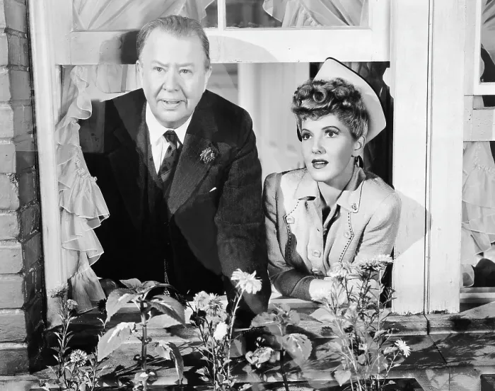 Framed Print : THE MORE THE MERRIER, from left, Charles Coburn, Jean Arthur, 1943