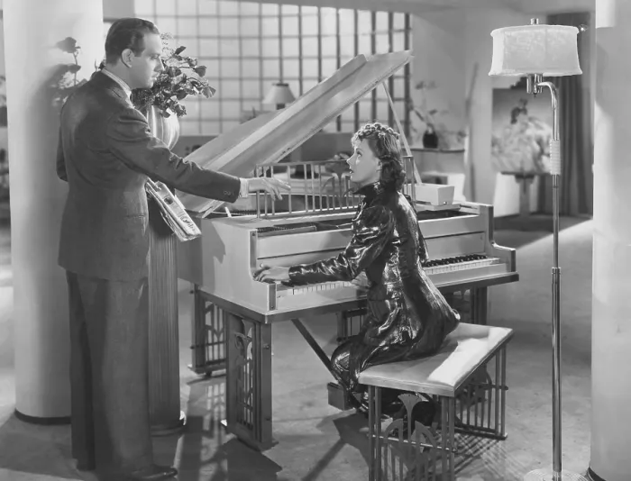 Framed Print : THEODORA GOES WILD, from left: Melvyn Douglas, Irene Dunne, 1936
