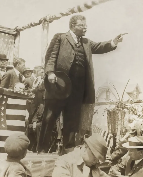 Framed Print : Theodore Roosevelt campaigning for President in New Jersey, June or August, 1912. TR gestures from a simple speakers platform, with a reporter taking notes below (BSLOC_2017_8_47) Framed Print : Theodore Roosevelt campaigning for President in New Jersey, June or August, 1912. TR gestures from a simple speakers platform, with a reporter taking notes below (BSLOC_2017_8_47)