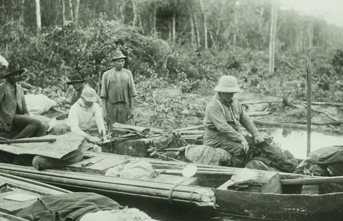 Framed Print : Theodore Roosevelt (right) in a heavily loaded dugout canoe, Feb. 27, 1914