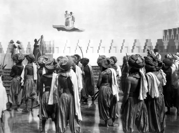 Framed Print : THE THIEF OF BAGDAD, Conrad Veidt (back left with arm raised), John Justin and Sabu on flying carpet, 1940