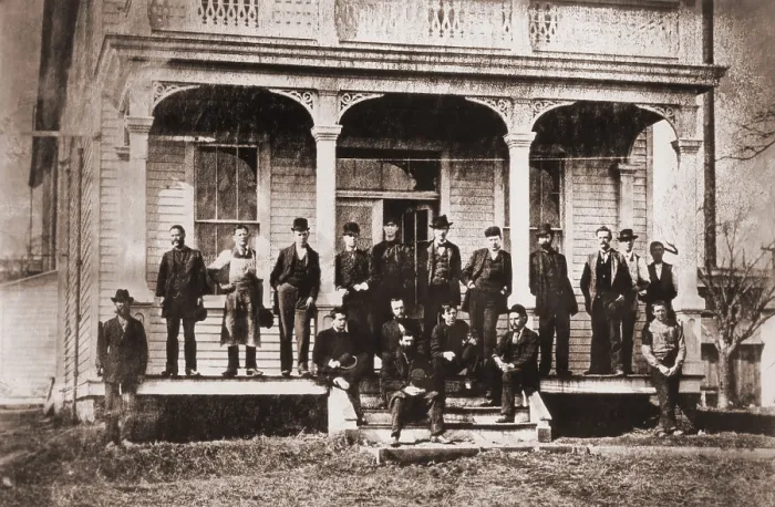 Framed Print : Thomas Edison with the engineers and technicians of his Menlo Mark workshop. Edison is under the central arch, leaning against the support with his hands in his pockets. Ca. 1880 Framed Print : Thomas Edison with the engineers and technicians of his Menlo Mark workshop. Edison is under the central arch, leaning against the support with his hands in his pockets. Ca. 1880