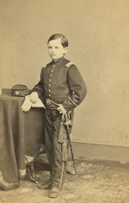 Framed Print : Thomas Tad Lincoln (1853-1871), youngest son of President Abraham and Mary Lincoln wearing a military style uniform. Ca. 1863. Portrait by Mathew Brady