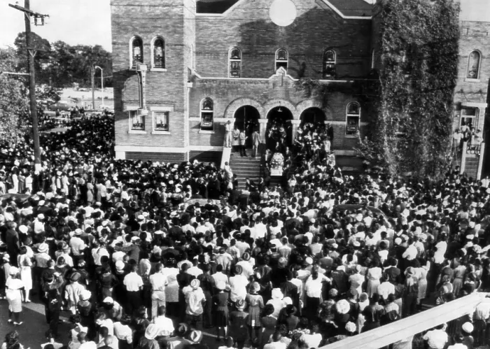Framed Print : Thousands of people crowd around the church where the funeral of three of the four girls killed in a church bombing is being held, Birmingham, Alabama, 1963