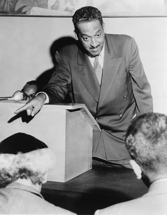Framed Print : Thurgood Marshall (1908-1993), Chief Counsel for the National Assn. for the Advancement of Colored People, talking to newsmen in New York City. 1955