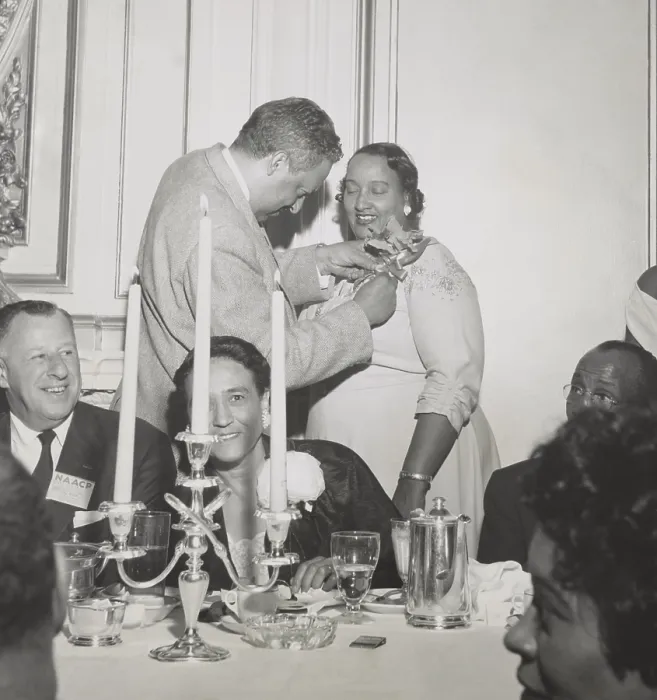 Framed Print : Thurgood Marshall pins orchid on Mrs. Lulu White, at Freedom Fund Dinner, June 28, 1956. He was attending the 47th annual NAACP Convention in San Francisco. Mrs