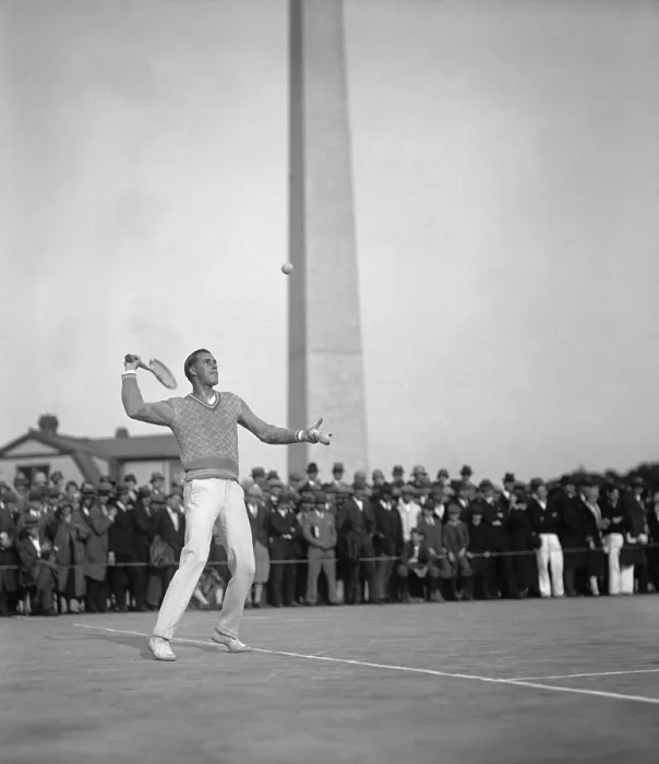 Framed Print : Bill Tilden, tennis champion serving on the Municipal Courts, Washington, D.C. May 6, 1926. Spectators watch from the sidelines with the Washington Monument in the background Framed Print : Bill Tilden, tennis champion serving on the Municipal Courts, Washington, D.C. May 6, 1926. Spectators watch from the sidelines with the Washington Monument in the background