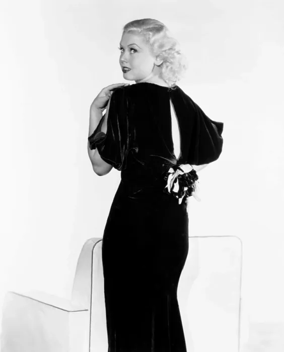 Framed Print : Toby Wing, modeling a burgundy chiffon-velvet gown, 1934