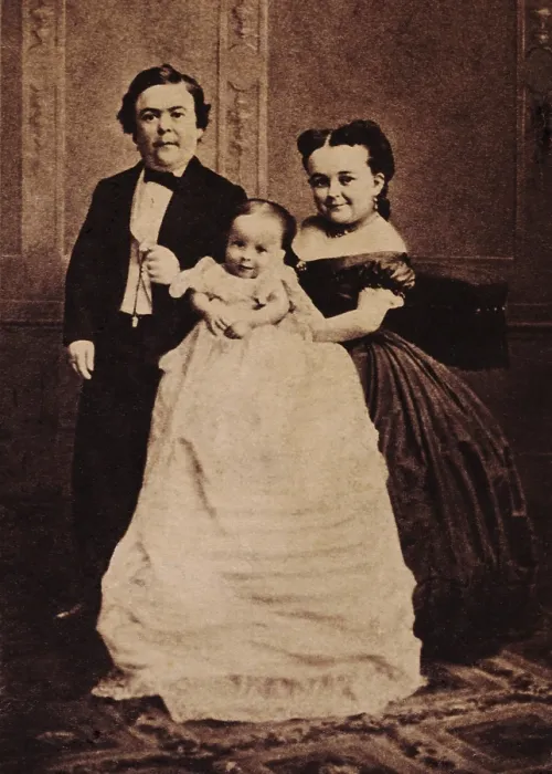 Framed Print : Tom Thumb and his wife, Lavinia Warren, pose with a baby, in a piece of Barnum humbug'. The couple were performers for P.T