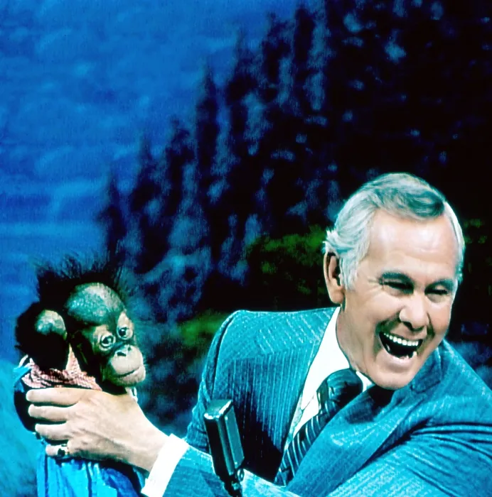 Framed Print : THE TONIGHT SHOW STARRING JOHNNY CARSON, Johnny Carson, holding a baby orangutan brought to the show by animal expert Joan Embery, (aired February 28, 1978), 1962-92 Framed Print : THE TONIGHT SHOW STARRING JOHNNY CARSON, Johnny Carson, holding a baby orangutan brought to the show by animal expert Joan Embery, (aired February 28, 1978), 1962-92