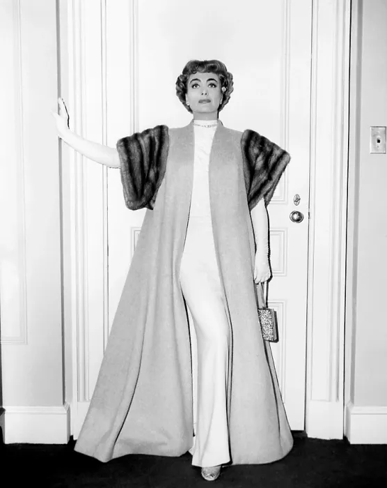 Framed Print : TORCH SONG, Joan Crawford, in a camel's-hair coat with mink trim, by Helen Rose, 1953