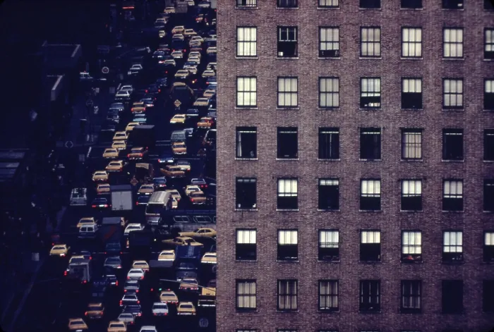 Framed Print : Traffic in New York City. View of vehicles on Manhattan's Sixth Avenue at 42nd Street is framed by a massive pre-war apartment building. Ca. 1973-75