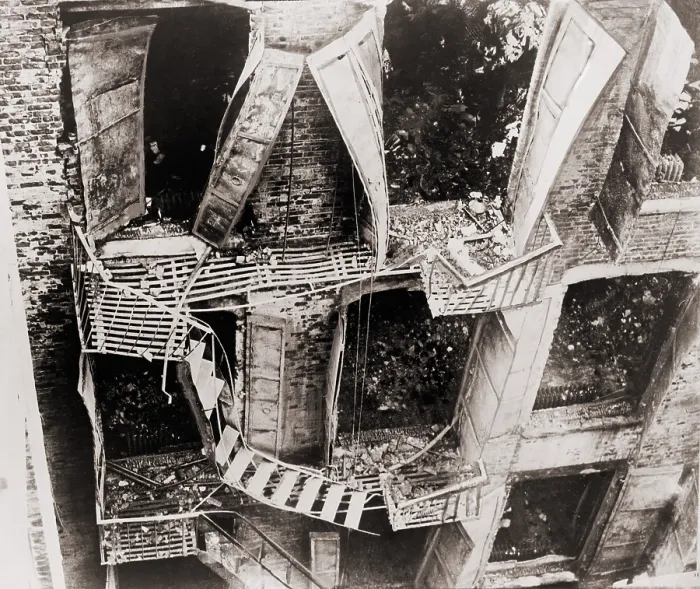 Framed Print : Triangle Shirtwaist Factory fire escape collapsed during the March 15, 1911 fire. 146 died, either from fire, jumping or falling to the pavement