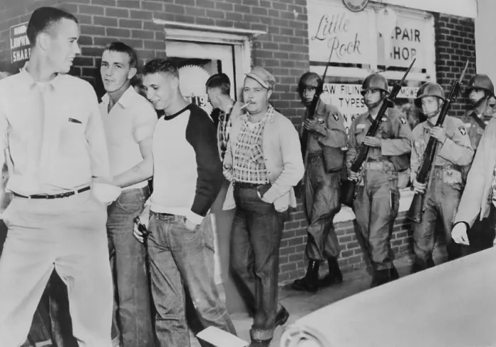 Framed Print : Troops of 101st Airborne Division move a crowd of White young men away from in front of Central High School in Little Rock, Arkansas. Sept.-Oct. 1957