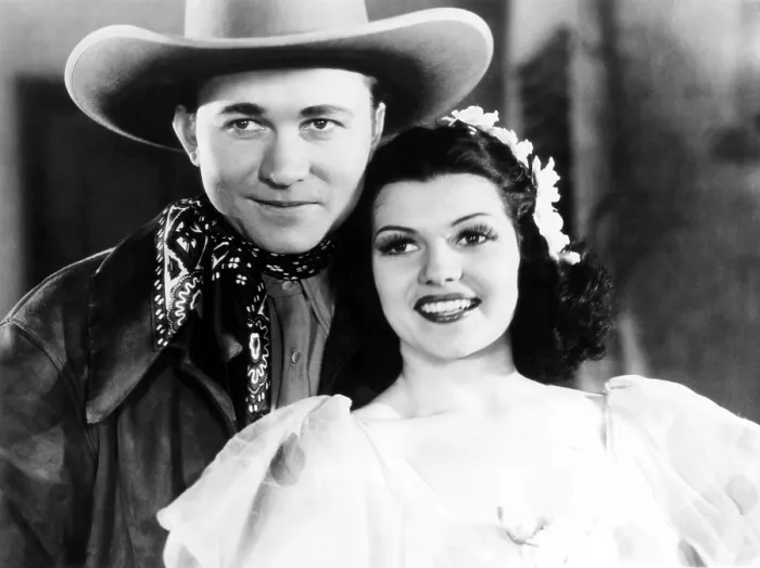Framed Print : TROUBLE IN TEXAS, from left: Tex Ritter, Rita Hayworth as Rita Cansino, 1937 Framed Print : TROUBLE IN TEXAS, from left: Tex Ritter, Rita Hayworth as Rita Cansino, 1937
