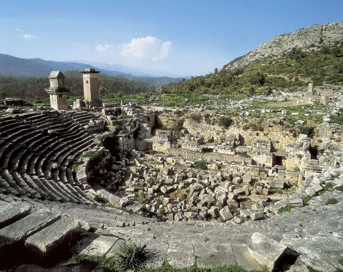 Framed Print : TURKEY. MEDITERRANEAN COAST. ANTALYA. Xanthus. Roman theatre (2nd c.). In the background on the left the funerary monument known as the Harpy Tower (480 BC). Roman art Framed Print : TURKEY. MEDITERRANEAN COAST. ANTALYA. Xanthus. Roman theatre (2nd c.). In the background on the left the funerary monument known as the Harpy Tower (480 BC). Roman art