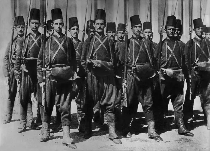Framed Print : Turkish army c. 1910-1913, in traditional uniforms. They have baggy pants, tunics worn under a short jacket, and the classic fez